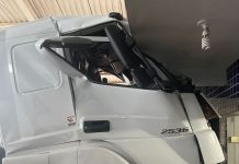 Câmera registra momento que caminhão se movimenta e provoca acidente dentro de oficina em Vilhena